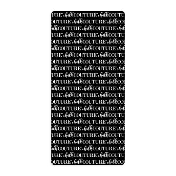 Show details for Ink Mat (11" x 23") A rectangular black mat with the white script text "chalk COUTURE" repeatedly printed diagonally across the surface, creating a repetitive pattern. The text alternates in orientation, enhancing the visual interest.