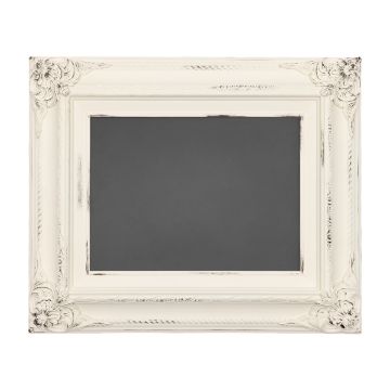Show details for Verity Frame (8½” x 11⅜”) An empty, ornate picture frame with intricate floral carvings on the corners, painted in a distressed white finish. The frame has a vintage, antique look and surrounds a plain black center, suitable for artwork or photographs.