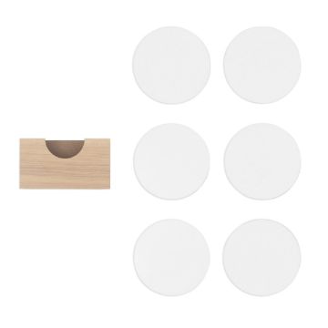 Show details for Coaster Set (7 Pieces) Five white circular coasters are placed in a grid. Next to them is a rectangular wooden holder with a curved slot for holding the coasters. The coasters are evenly spaced, with the holder positioned on the left side.