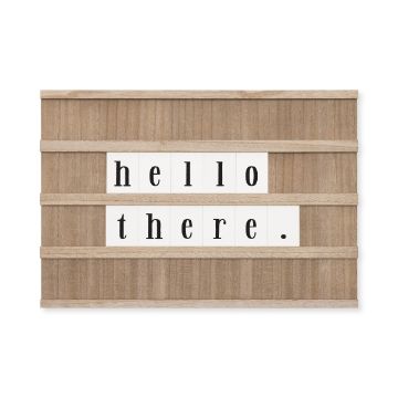 Show details for Black Velvet Paste Single A paste with evenly spaced horizontal slats displays the text "hello there." in black lowercase letters on white rectangular panels. The paste has a rustic, minimalist design and is set against a plain white background. This product is by Chalk Couture.