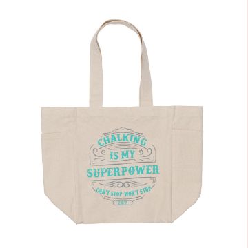Show details for Couture Teal Ink Single A beige tote bag with long handles features teal and light blue text on the front that reads, "Chalking is my superpower. Can't stop, won't stop. 24/7.” The text is surrounded by decorative flourishes from Chalk Couture's ink collection.