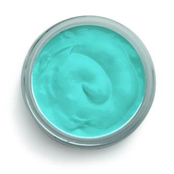 Show details for Couture Teal Ink A top-view photo of a round, open container filled with a smooth, light turquoise-colored cream. The cream has a slightly glossy texture and appears to be evenly swirled within the container. The container has a shiny, metallic rim. This product is "ink" by Chalk Couture.