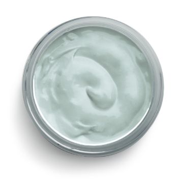 Show details for Eucalyptus Ink A top-down view of a round container filled with light blue, creamy Chalk Couture ink. The texture appears smooth and thick, with a slightly glossy surface, indicating it's a moisturizing or hydrating product. The container is likely made of plastic.