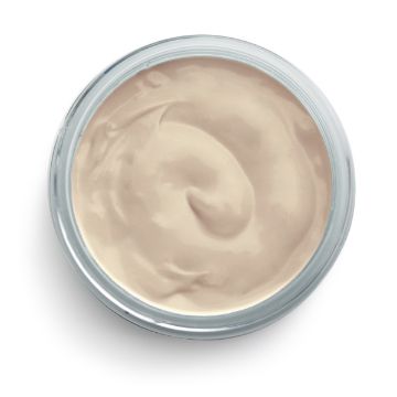 Show details for Dune Ink A small circular container of beige ink with a swirl pattern on its smooth surface. The container has a silver rim, and the ink looks rich and velvety in texture. The image is taken from a top-down view by Chalk Couture.