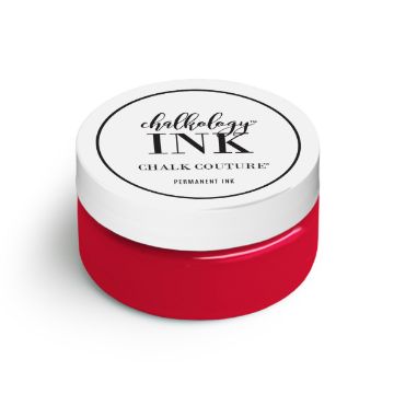 Show details for Candy Apple Ink A small round jar with a white lid labeled "ink Chalk Couture." The jar contains bright red permanent ink. The label on the lid is black and white, giving a stylish and straightforward look.