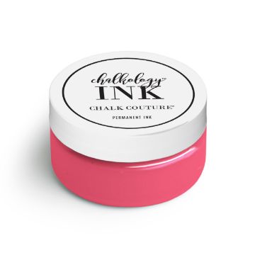 Show details for Couture Coral Ink A round white container with a white lid labeled "ink, Chalk Couture, Permanent Ink." The container is filled with bright pink ink.