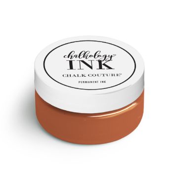 Show details for Papaya Ink A small round container with a white lid displaying the text "ink, Chalk Couture, PERMANENT INK." The container appears to hold terracotta-colored ink.