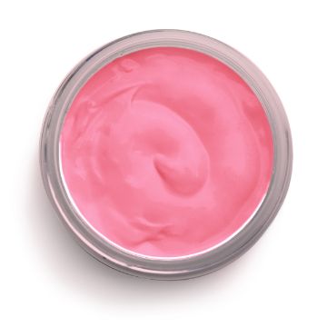 Show details for Couture Coral Paste An open container filled with smooth, creamy pink paste, likely a cosmetic product such as face cream or body lotion, seen from above. The container has a silver rim, and the Chalk Couture paste appears silky and well-mixed.