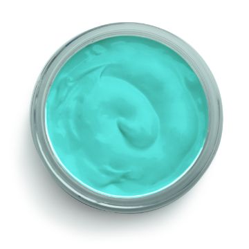 Show details for Couture Teal Paste A top view of an open jar filled with smooth, turquoise-colored Chalk Couture paste. The contents have a glossy and creamy texture, with a slight central swirl pattern. The jar appears to be made of clear plastic or glass.
