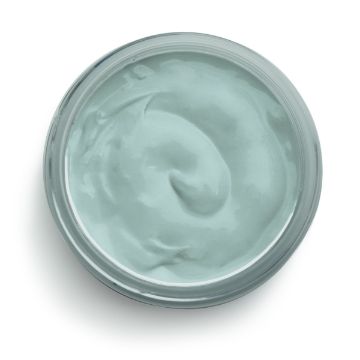Show details for Eucalyptus Paste A round, open container filled with a pale blue, creamy substance. The paste appears smooth and well-mixed, with a subtle sheen. The container's rim is silver, and the background is plain and white, emphasizing the contents of Chalk Couture's jar.