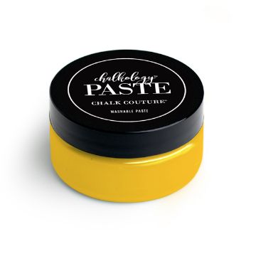 Show details for Bumblebee Paste A round container with a black lid labeled "paste, Chalk Couture, Washable Paste" sits on a white surface. The container is yellow and slightly translucent, suggesting it contains yellow washable paste.