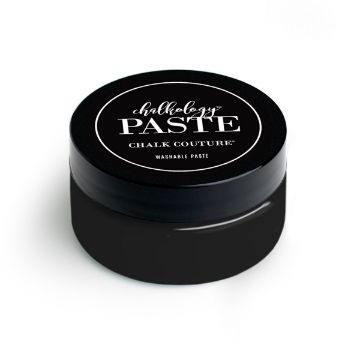 Show details for Black Velvet Paste A black, round container with a screw-on lid, labeled "paste" and "Chalk Couture." The label also states "Washable Paste." The container has a simple, minimalist design with white text on a black background.
