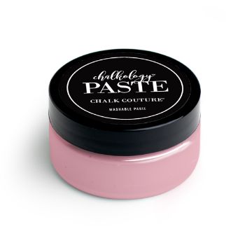 Show details for Mauvelous Paste A small, round container of pink paste from Chalk Couture is shown with a black lid. The label on the lid reads, "paste, Chalk Couture, Washable Paste." The paste can be used for crafting and creating designs.