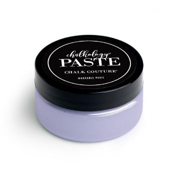 Show details for Wisteria Paste A small, round container with a black lid labeled "paste, Chalk Couture, Washable Paste." The container is filled with purple chalk paste. The background is white.