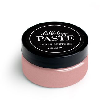 Show details for Shimmer Melon Paste A small, round container with a black lid labeled "paste" from Chalk Couture. The container is filled with light pink, washable chalk paste.