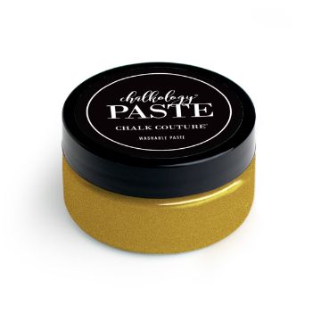 Show details for Shimmer Gold Paste A photo shows a jar of paste by Chalk Couture. The jar has a gold body and a black lid with the product name labeled on top in white lettering. The paste is described as washable.