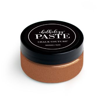 Show details for Shimmer Copper Paste A small round container with a black lid and a brown base. The label on the lid reads "paste Chalk Couture® WASHABLE PASTE." The container is used for holding chalk paste.