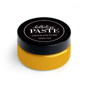 Show details for Shimmer Harvest Paste A round container of paste by Chalk Couture with a black lid and a label that reads "Chalkology Paste Chalk Couture Washable Paste." The bottom half of the container is yellow in color.