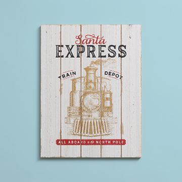 Show details for Santa Express A decorative sign on a light blue background featuring a vintage illustration of a train. The text reads "Santa Express" at the top, with smaller signs reading "Train" and "Depot" on either side of the train image, and "All aboard to the North Pole" at the bottom.