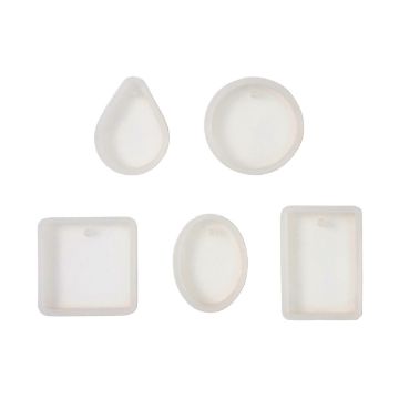 Show details for Pendant Molds Five translucent silicone molds of different shapes: a teardrop, circle, square, oval, and rectangle, each with a small hole at the top, displayed on a plain white background.