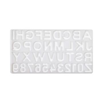 Show details for Alphabet Mold A clear stamp with uppercase letters A-Z and numbers 0-9 in mirror image formation on a rectangular transparent base. The letters and numbers appear backwards, suitable for stamping in the correct orientation.