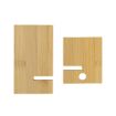 Two rectangular wooden pieces with a smooth finish are positioned side by side. The piece on the left has a notch, while the piece on the right has a notch and a circular hole. Both have a natural wood grain texture.