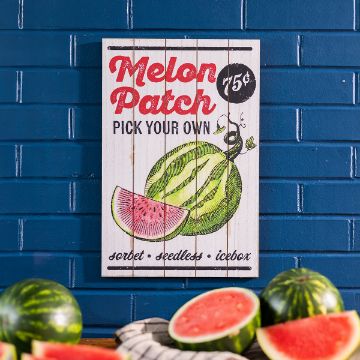 Show details for Melon Patch A retro-style sign on a blue brick wall reads "Melon Patch 75¢, Pick Your Own, sorbet, seedless, icebox" with illustrations of watermelons. Fresh watermelon and slices are displayed below.