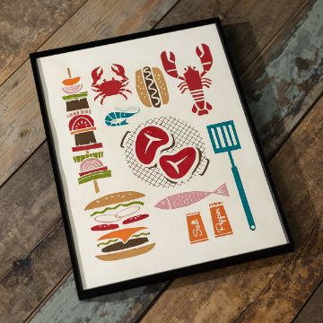 Show details for Well Done A framed print featuring colorful illustrations of grilling foods, including skewers, crabs, steak, lobster, hot dog, fish, burger, sandwich, salt and pepper shakers, and a spatula, placed on a wooden surface.