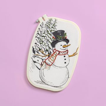 Show details for Down To The Village Embroidery Floss & Needle An embroidery of a smiling snowman with a red scarf and black top hat, standing in front of a snow-covered tree, displayed in an oval embroidery hoop on a pastel pink background.
