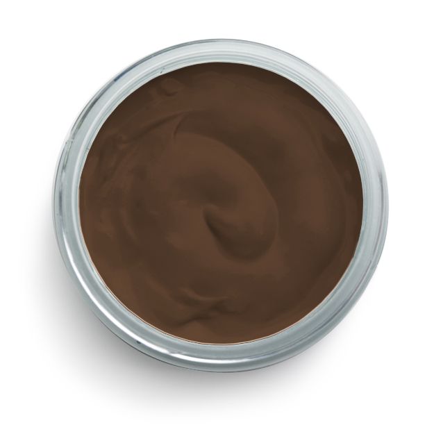 A top-down view of an open jar filled with smooth, creamy, dark brown chocolate spread.