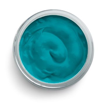 Show details for Lagoon Paste (En Vogue) A top-down view of a round container filled with smooth, bright teal-colored cream or gel, creating a swirled pattern on the surface.