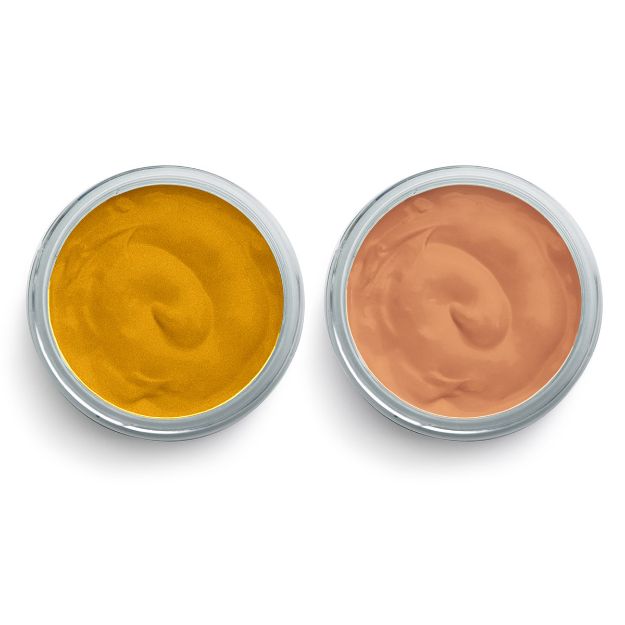 Two round, open containers are shown side by side; one contains a smooth, yellow cream, and the other contains a smooth, peach-colored cream. Both have metallic lids and a swirled surface texture.