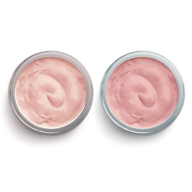 Two open jars of cream in metallic containers, each filled with a smooth swirl of pink and light pink-colored cream, viewed from above on a white background.