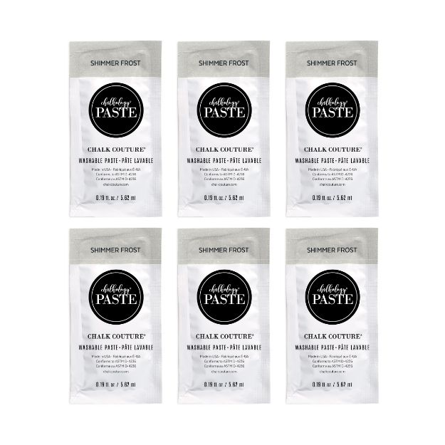 Six packets of Chalk Couture Shimmer Frost washable chalk paste are arranged in two rows of three on a white background. Each packet is silver and white with black circular labeling.