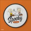 A round sign with cartoon characters Charlie Brown, Snoopy, and Linus sitting together above the words “Spooky Crew” and “Good Grief!” on a white background, with an orange backdrop.