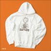 A white hoodie with a hood, featuring a sketch-style drawing of a messy character and the text “THE WORLD NEEDS MESSY PEOPLE!” on the front, laid flat on an orange background.