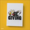 An illustration of Charlie Brown giving Snoopy a red gift box, with autumn leaves around them. The words “BE GIVING” are written in bold black letters beneath the characters on a white canvas, set against a yellow background.
