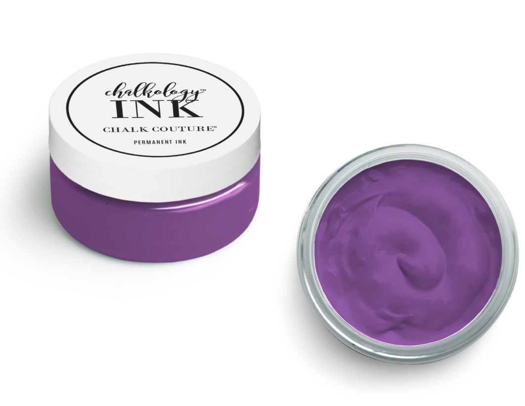 A small open jar of Chalk Couture ink in vibrant purple. The jar has a white lid labeled "chalkology INK Chalk Couture PERMANENT INK," and the creamy ink inside is visible from above.