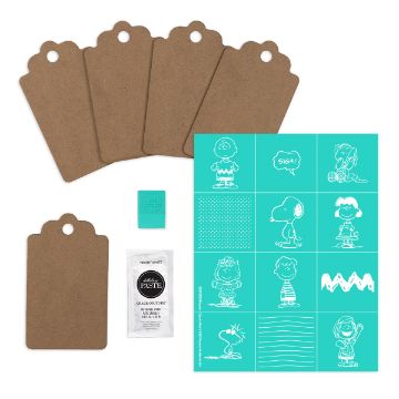 Show details for Peanuts - Classic Minis Try-Me Kit Five brown gift tags, a small teal square, a white paste packet, and a teal stencil sheet with white Peanuts character outlines and patterns, all arranged on a white background.