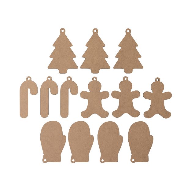 A set of brown cardboard cutouts in holiday shapes, including Christmas trees, candy canes, gingerbread people, and mittens, each with a hole for hanging.