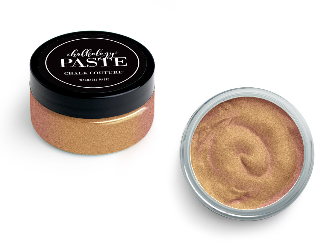 A small round container of shimmery gold chalk paste with a black lid labeled "Chalkology Paste Chalk Couture." The container is shown closed and open, displaying the swirled metallic paste inside.