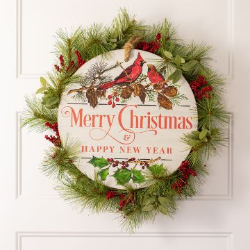 Show details for Merry Message A festive wreath with pine branches, red berries, and green leaves surrounds a round sign reading “Merry Christmas & Happy New Year” with two red cardinals and pinecones, hanging on a white door.