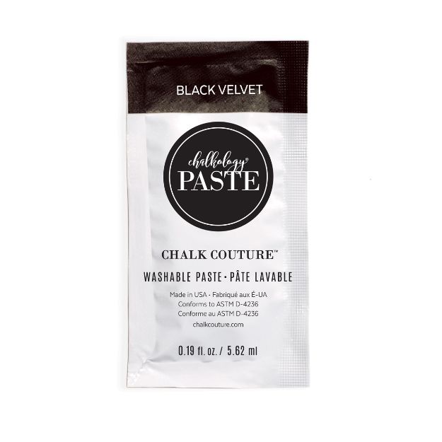 A single-use packet of Chalk Couture washable paste in the Black Velvet color, featuring product details and branding on a white and black sachet.