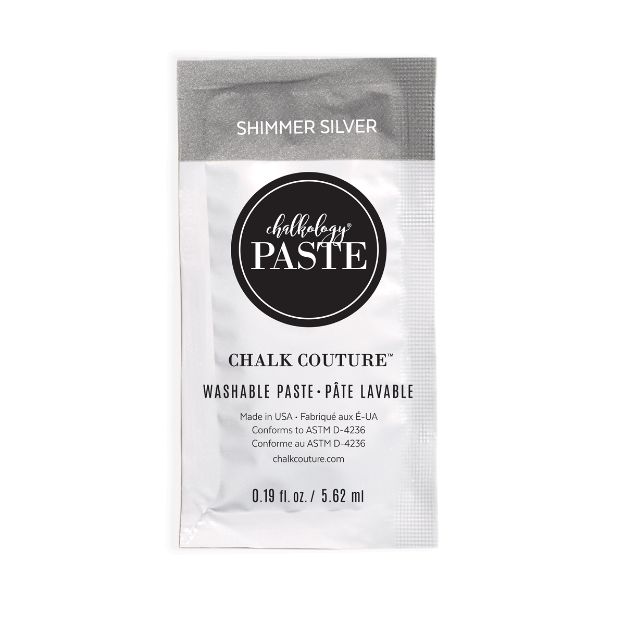 A silver sachet labeled "Chalk Couture Chalkology Paste, Shimmer Silver." The packet contains 0.19 fl oz (5.62 ml) of washable paste and displays manufacturing and conformity information.