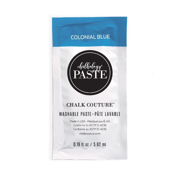 A small packet of Chalk Couture washable paste in the color Colonial Blue, featuring a blue and white design with product details and branding on the front.