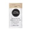 A single-use packet of Chalk Couture washable paste in the color “Dune.” The packet is white with a beige top, black and white circular logo, and product details printed in English and French.
