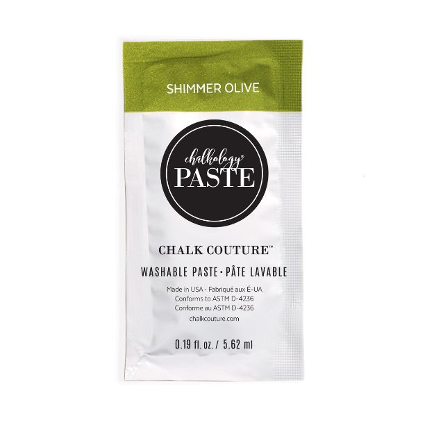 A single-use packet of Chalk Couture Washable Paste in "Shimmer Olive." The packet is white with a green top and black circular logo. Text includes usage details, volume (0.19 fl oz/5.62 ml), and website information.