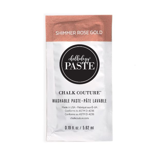 A small packet of Chalk Couture Washable Paste in "Shimmer Rose Gold." The front label shows product details, including size (0.19 fl oz / 5.62 ml) and manufacturer information.