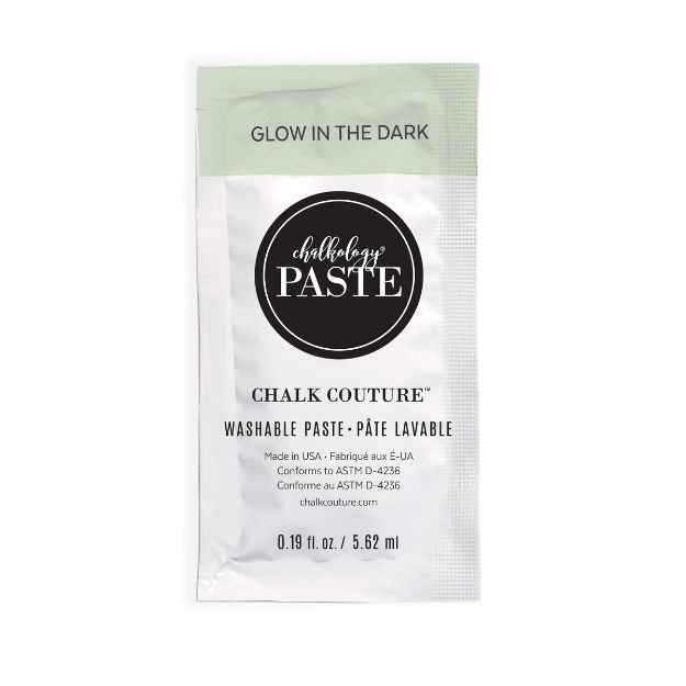 A small packet labeled "chalkology PASTE" from Chalk Couture. The top of the packet says "GLOW IN THE DARK." The packet contains 0.19 fl. oz. (5.62 ml) of washable paste.