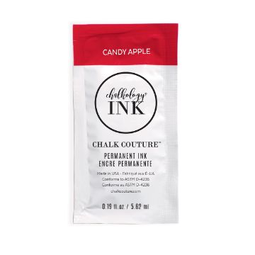 Show details for Candy Apple Ink Single A small packet of Chalk Couture permanent ink in the color "Candy Apple," featuring a red and white design with product details and branding on the front. The packet contains 0.19 fl oz (5.62 ml) of ink.